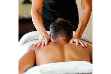 Therapist providing a relaxing therapeutic massage